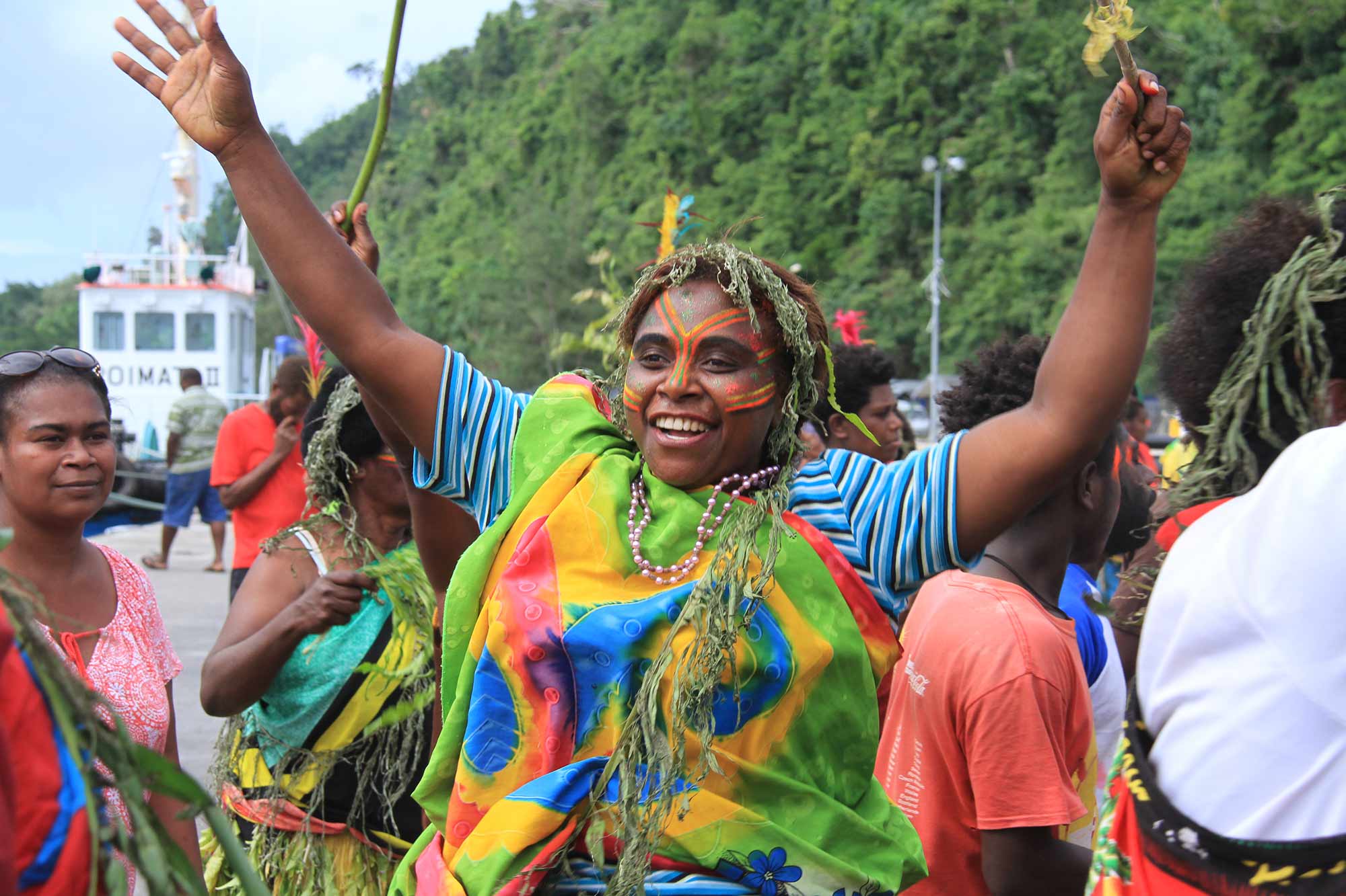 Women in Vanuatu celebrate the arrival of the Greenpeace Rainbow