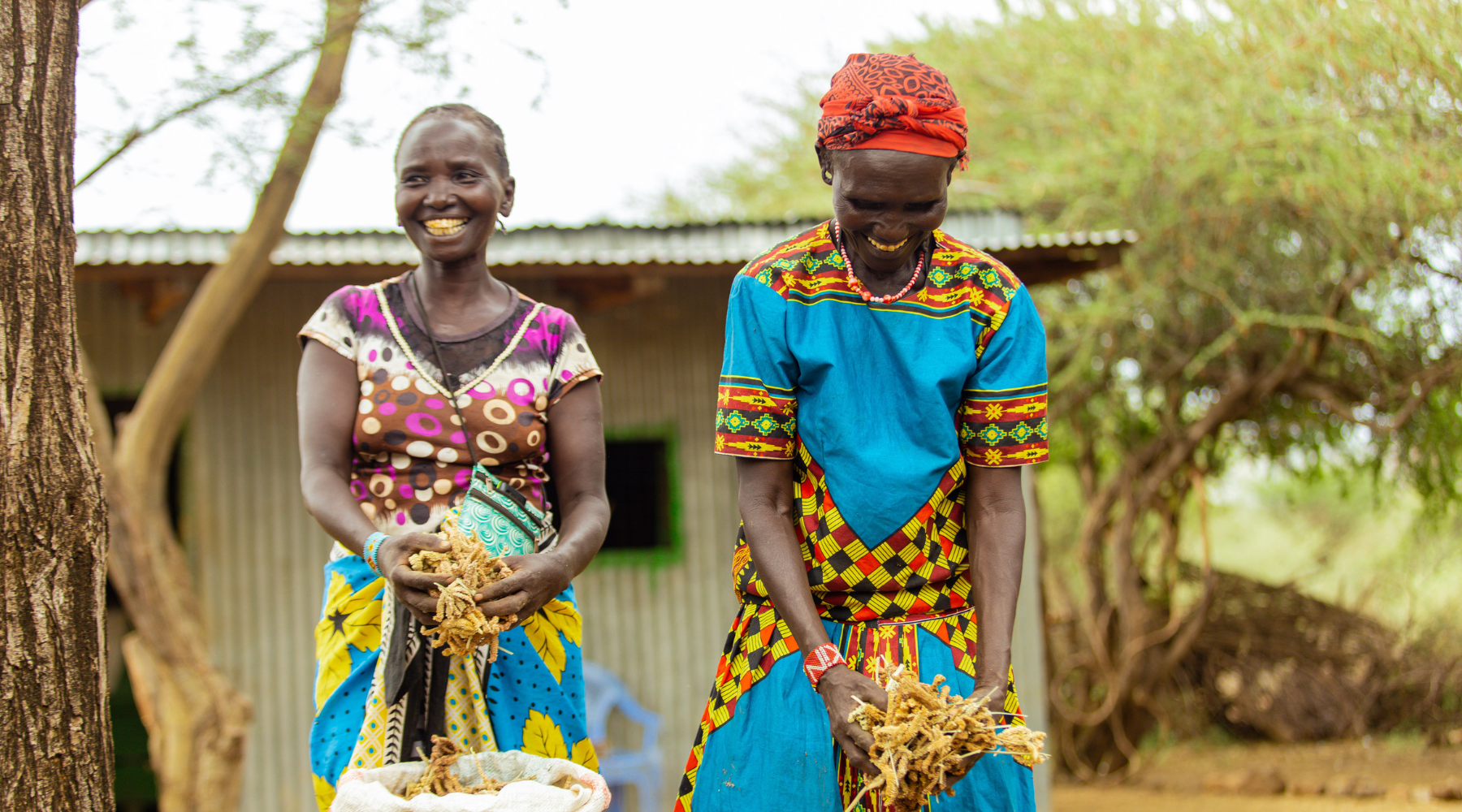 With a passion for agriculture, Elizabeth (right) cultivates vegetables on her farm in Kenya, contributing not only to her sustenance but also to the local market. 